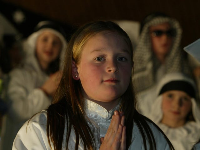 Emily Toland of Trench road PS, performing at the schools carol service. (1912JB01):Derry nativities and Christmas shows from December 2003