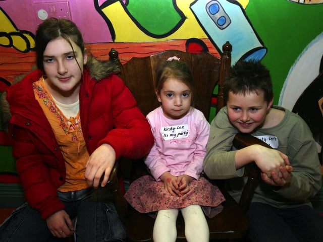 Danielle,Birthday Girl Kirsty Lee, and Conner smile for the camera.0015/JML : Parties across Derry in January 2006.
