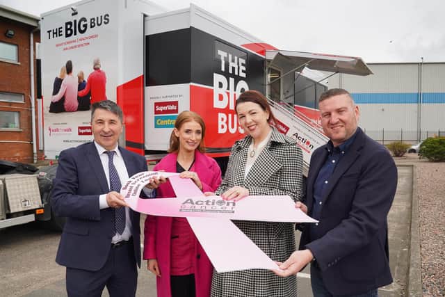 L-R Action Cancer’s CEO Gareth Kirk and the charity’s Advanced Practice Radiographer Donna McKernan welcome new Patron Lisa McGee to the Big Bus alongside Desi Derby, Director of Marketing, Musgrave Northern Ireland. Photo: Brian Thomson.