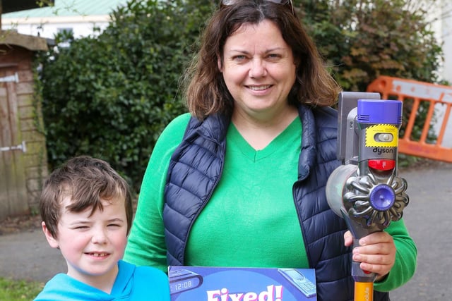 Jacqueline Whoriskey and her son Emmett with her fixed vacuum cleaner.