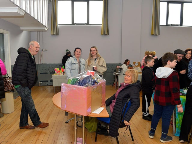 Enjoying the banter at the Spring Craft Fair held in St Mary’s Hall Muff on Sunday last. Photo: George Sweeney. DER2310GS – 006