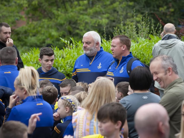 Coaches prepare to set off on the parade through the city from Magee University.