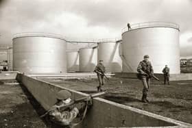 Army take over oil depots and garages.