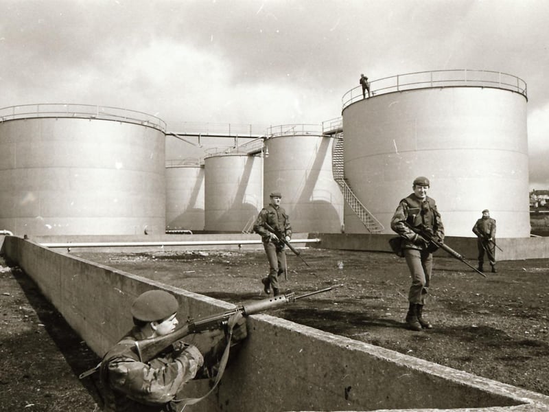 Army take over oil depots and garages.