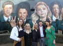 Derry Girls creator Lisa McGee (right) with cast members Louisa Harland, Nicola Coughlan, Saoirse-Monica Jackson and  Dylan Llewellyn at the 'Derry Girls' mural painted by UV Artists on the gable wall of Badger's Bar, Derry. (Photo Lorcan Doherty)