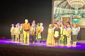 Gaelscoil Éadain Mhóir pupils on stage at Féile Scoildramaíochta Uladh.