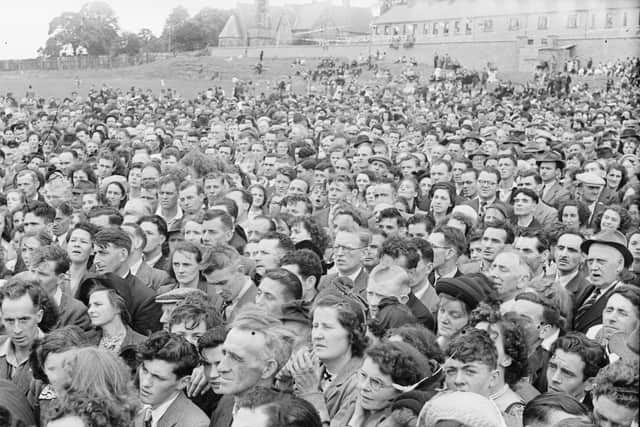 Crowds gather for a Civil Rights meetings at Celtic Park in the late 1960s.