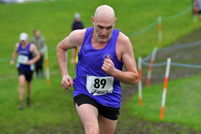 Foyle Valley’s Aron Cole runs in the Derry XC 6k Open race at Thornhill College. Photo: George Sweeney