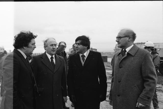 SDLP Leader John Hume with construction firm representatives and dignitaries during a visit by the European Commissioner for European Commissioner for Taxation, Consumer Affairs, Transport and Parliamentary Relations, and Inter-institutional Relations and Administration, Richard Burke.