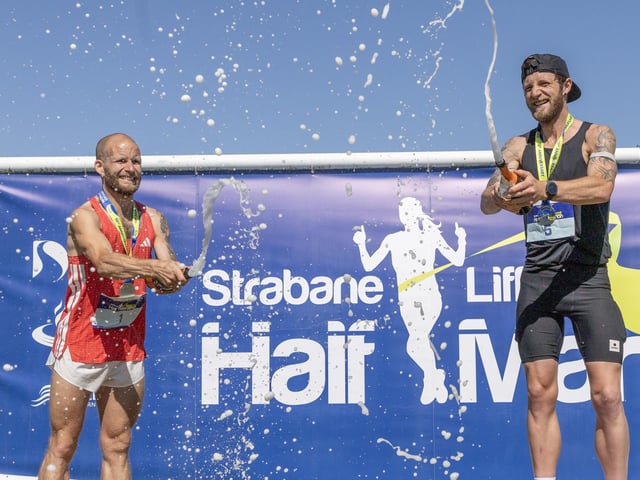 Kyle Doherty (2nd) and Stephen McCauley (1st) celebrate a superb battle with some champagne.