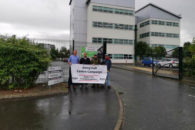 Call centre workers protest against redundancies outside Firstsource