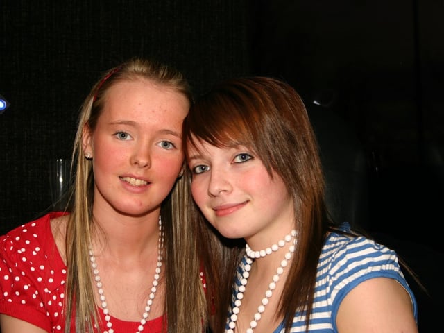 Cousins Sinead Mc Gilloway and Aiofe McMonagle sharing their 15th birthday together as the wheels on the bus go round and round as they set off to the town in the Starlight Express. 3655/dd : Parties in Derry in Spring 2006.