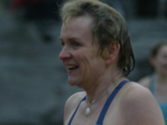 Freda Mooney from Derry gives a smile of relief as she leaves the water during the New Years Day swim at Culdaff. (0301JB10)