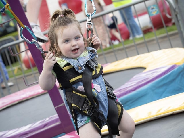 A bouncing toddler at the Gasyard on Friday. (Photos: Jim McCafferty Photography) : .
