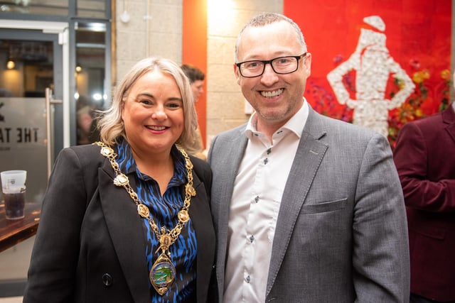The Mayor, Councillor Sandra Duffy and Aidan O’Kane, pictured at the opening of The Taproom at the Walled City Brewery. Picture Martin McKeown. 21.10.22
