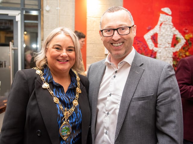 The Mayor, Councillor Sandra Duffy and Aidan O’Kane, pictured at the opening of The Taproom at the Walled City Brewery. Picture Martin McKeown. 21.10.22
