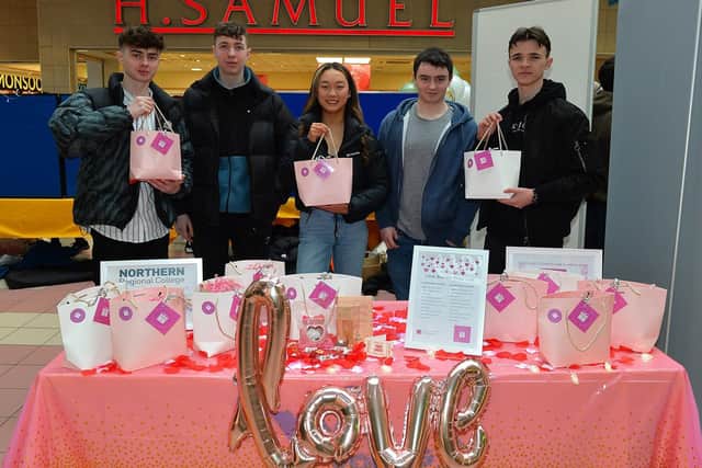 Students from the Northern Regional College Coleraine pictured at their ‘Love Bundle’ gift stall during the Young Enterprise trade fair held in the Foyleside Shopping Centre on Friday. Photo: George Sweeney. DER2307GS – 55