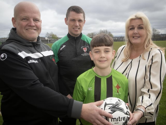 St. Joseph's Boys' School principal, Mrs. Ciara Deane pictured with U12 captain Kian Gibbons, his dad and manager, Paul, and coach Emmett McGinty wishing the team all the best for Thursday's final.