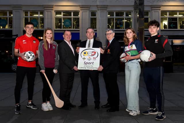 Young sports volunteers from Ulster GAA, Ulster Rugby and the Irish Football Association with Ciaran McLaughlin, Ulster GAA President, Patrick Nelson, Irish FA CEO, and Denis Gardiner, Ulster Rugby President. (Photo: John Merry)