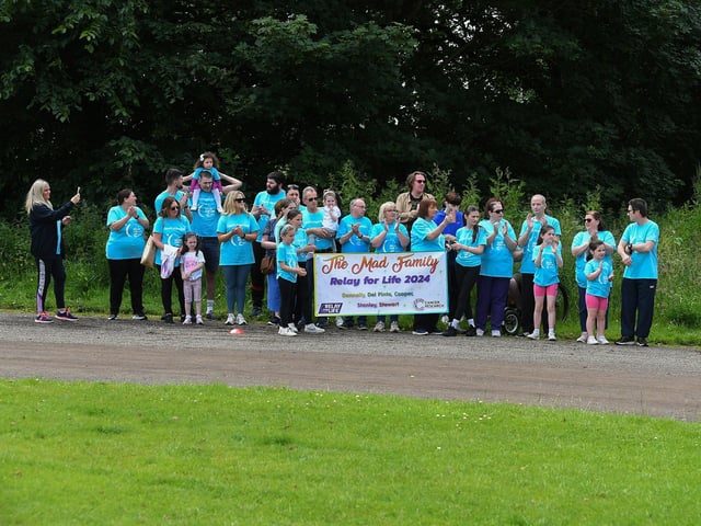 Relay teams gather for the cancer survivors inspiring Lap of Honour around St Columb’s running track prior to 40 fund-raising teams begin the opening laps of the 24 hour relay. Photo: George Sweeney.