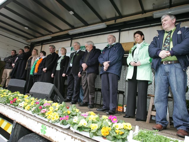 The judging panel pay their respects to the late Leo Rodden during Thursday's parade. (1803C46) : St Patrick's Day Buncrana 2005.