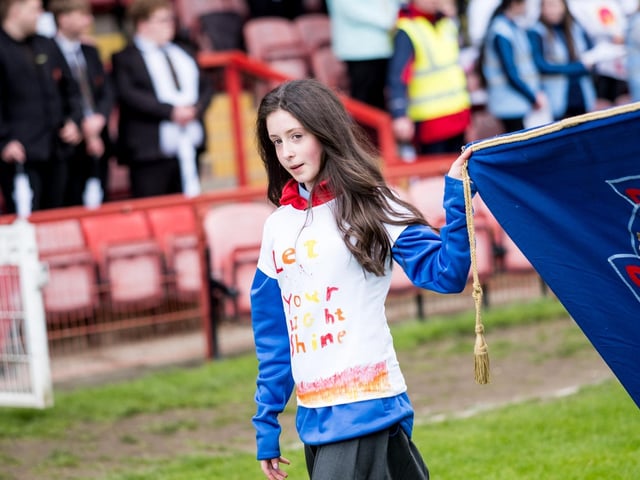 Participants at the Derry Diocese Fan The Flame annual Mass 2025 in Celtic Park.