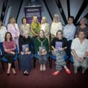 The Mayor of Derry City and Strabane District Council, Grace Ui Niallais pictured at Tuesday night's Derry Well Women 38th AGM in Queen Street with staff and Board members. Included front from left – Marie-Claire McLaughlin (Board),  Rhonda Murphy (staff), Phil Mahon (Chair), Aibhlin O’Hagan (Board), Patricia Villa (staff). Back row, from left Paula Barr (Board), Mary Diamond (Board), Joanne Gormley (Board), Tracy Harrison (staff), Nuala Doherty (Board) Sandra McNeill (Board) and Karen Meehan (Board).  (Photos: Jim McCafferty Photography)