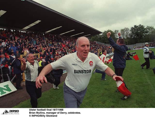 Brian Mullins, manager of Derry, celebrates winning the Ulster football final in 1998.