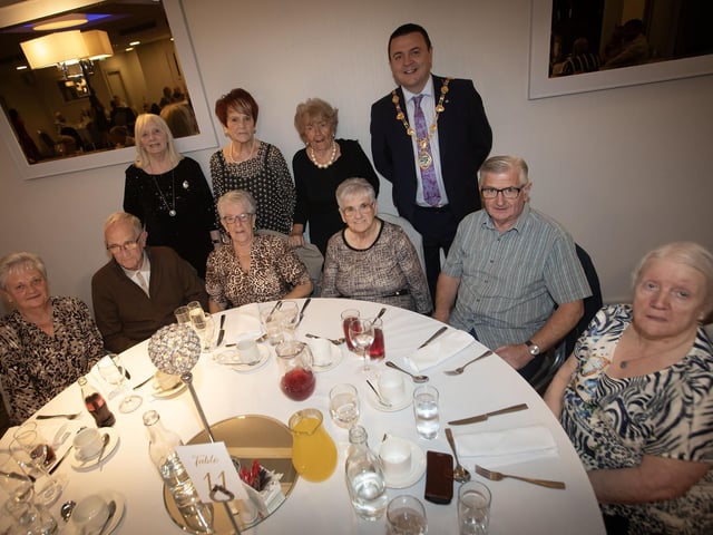 Mayor McHugh pictured with some of the residents of Creggan celebrating Saturday night's anniversary at the Maldron Hotel. : .