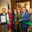 Ribbon cutting with Ambassador Byrne Nason and Mark Owen and his family.