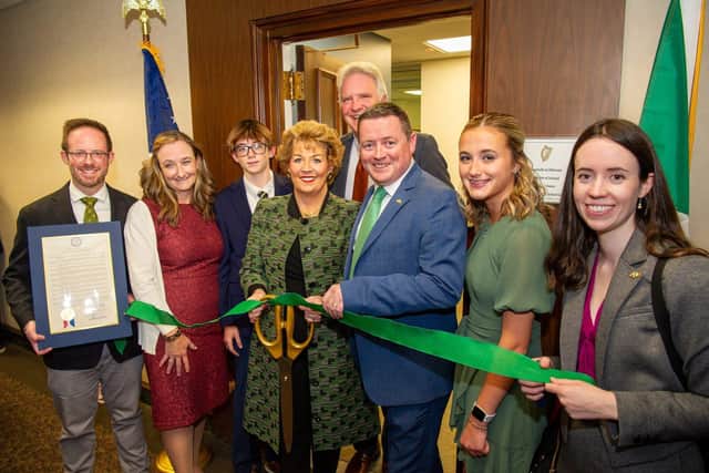 Ribbon cutting with Ambassador Byrne Nason and Mark Owen and his family.
