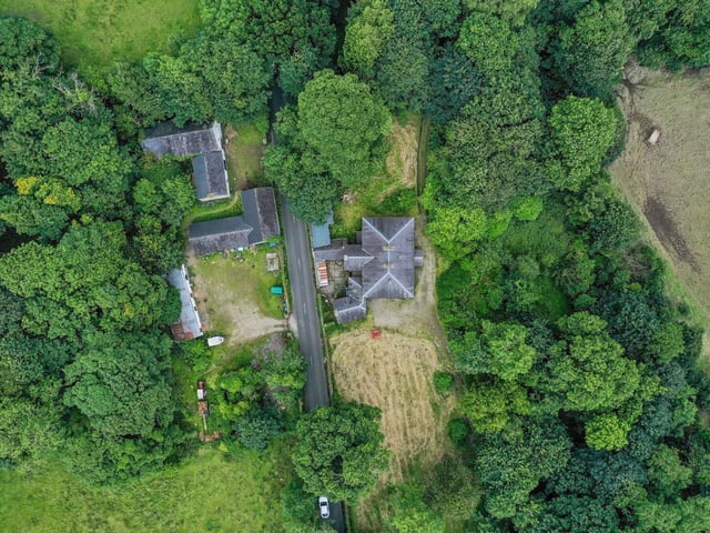 Brookhill House, 33 Ardlough Road is for sale at £650,000. The detached country residence was built around 1795 and comes with 35 acres of land. The house boasts seven bathrooms, three reception rooms and three bathrooms.:Brookhill House on the Ardlough Road.