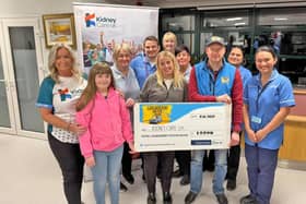 Attending the Legenderry Motor Show cheque presentation at Altnagelvin Hospital Renal Unit were staff from Altnagelvin Renal Unit with Jo-Anne Dobson – NI Ambassador for Kidney Care UK alongside Legenderry Motor Show organiser Richard Gillespie with his daughter Rachel and kidney recipient Heather Vance.