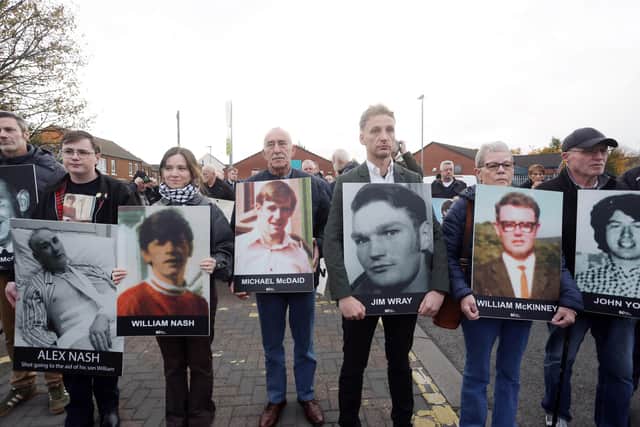Families of the Bloody Sunday victims pictured previously with photos of their loved ones. Picture by Jonathan Porter/PressEye
