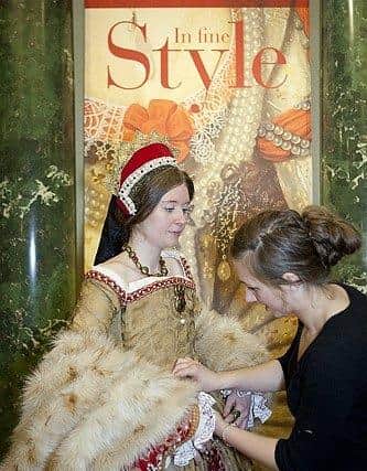 Making tweaks on Queen Catherine Parr costume at Buckingham Palace in 2013