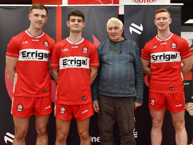 Charlie Bonner, Derry GAA safety officer, pictured with county players John Mullan (hurling), Patrick McGurk (football) and Marty Bradley (football) at the launch of Derry’s new home and away jersey, for the 2026/2027 season, at O’Neill’s sports store in Waterloo Place on Thursday evening. Photo: George Sweeney