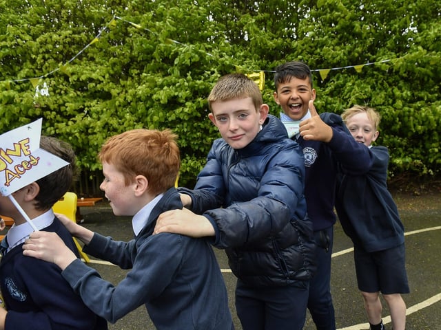 Happy pupils from Rosemount Primary School enjoy the entertainment from the Jive Aces on Thursday morning. Photo: George Sweeney