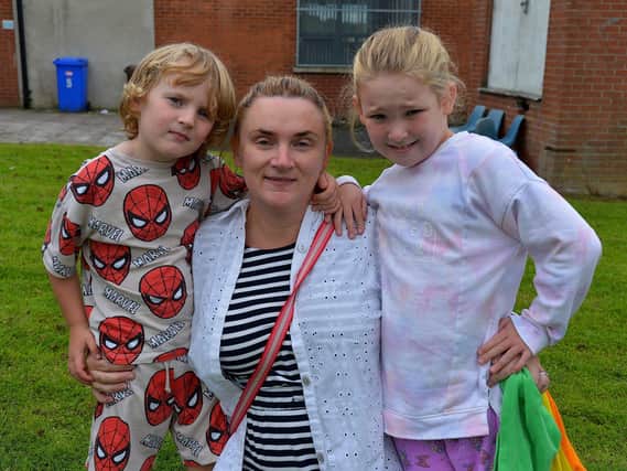 Niall Og and Shenna McLarnon with their mum Jeanie at the Pennyburn Youth Club fun day on Friday afternoon last. Photo: George Sweeney. DER2331GS – 95