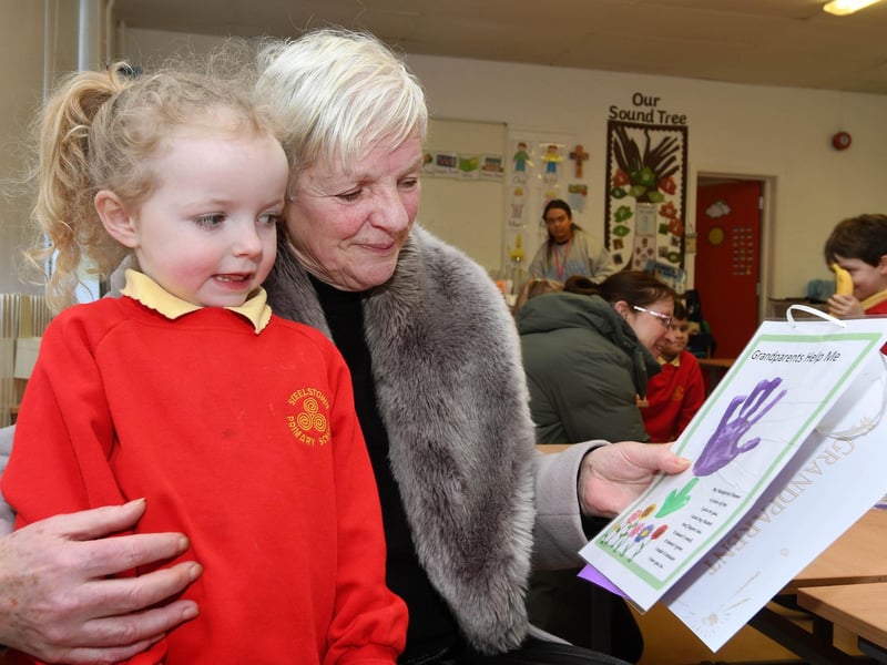 Primary 1 pupil Jayda shows granny her school work on Wednesday last.