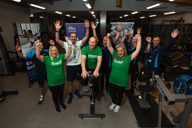 Norman Todd pictured during his triathlon in the Derg Valley Leisure Centre with front, Michelle McDougall, Siobhan Burns, and back, with DC&SDC Council Team, Robert Snodgrass, Fitness Instructor, Sean Hargan, Move More Coordinator, Vincent McCarron, Referral Program Consultant, Nik Monteith, Fitness Instructor, and Anthony McGonagle, Participation Retention Officer.