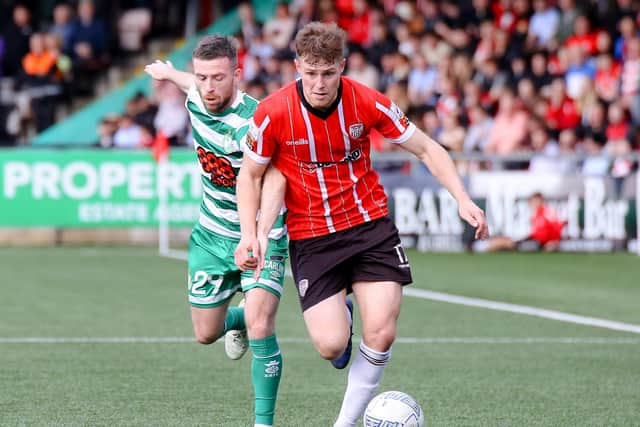 Derry City's Cameron McJannet runs away from Shamrock Rovers' Jack Byrne. Picture Kevin Moore/mci