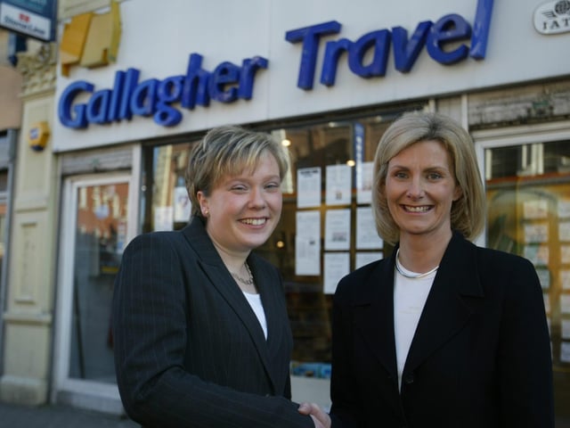 Laura Gallagher (right) wishes new owner Heather Fielding all the best at Gallagher Travel in Derry.