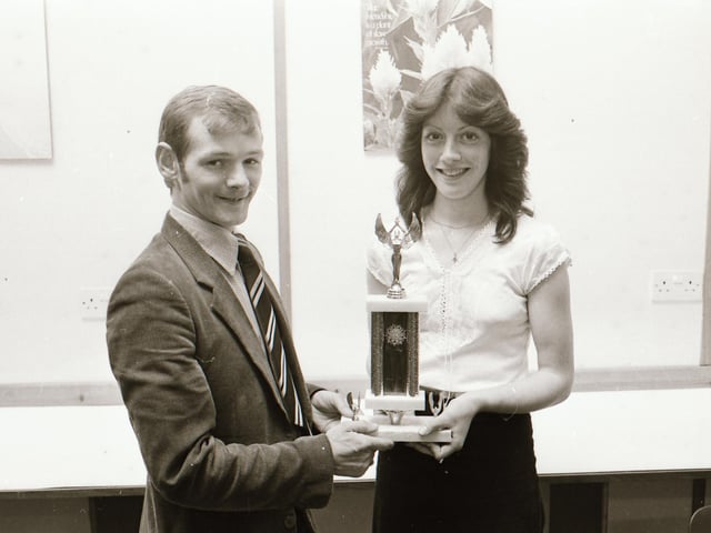 Irish flyweight boxing champion Neil McLaughlin presents the 'Clubgirl of the Year' award to Bronagh Fagan, at St. Brigid's Youth Club, Carnhill.