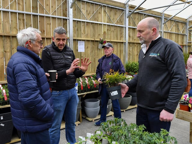Chartered Horticulturist and BBC Radio Foyle gardening expert Gareth Austin, centre, and Gareth Whitmore, on the right, CEO of the Inishowen Cooperative Centre speaking to a customer in the newly opened Co-op Garden Centre in Buncrana. Photo: George Sweeney