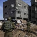 Israeli troops operating in the area of al-Bureij in the central Gaza Strip in January. (Photo by Menahem KAHANA / AFP) (Photo by MENAHEM KAHANA/AFP via Getty Images)