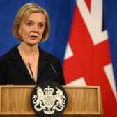 British Prime Minister Liz Truss during a press conference in the briefing room at Downing Street, London. Friday October 14, 2022. Daniel Leal/PA Wire