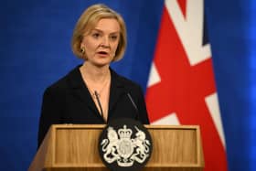 British Prime Minister Liz Truss during a press conference in the briefing room at Downing Street, London. Friday October 14, 2022. Daniel Leal/PA Wire