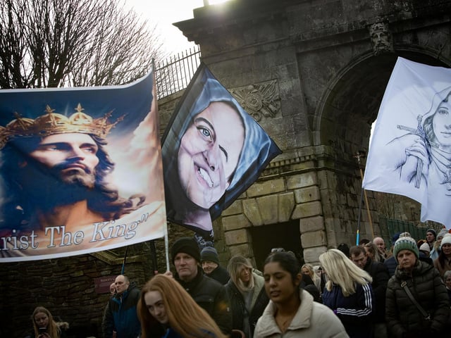 Some of the flags being carried through Bishop's Gate on Saturday.