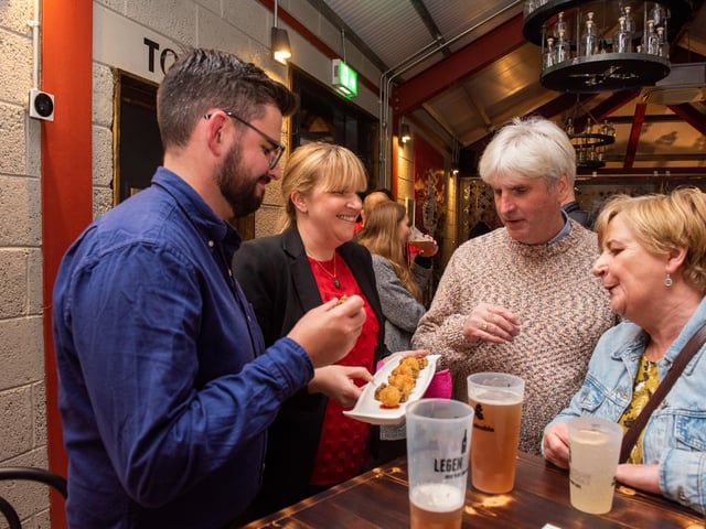 Josh Kyle and Catherine Hamilton from the Walled City Brewery and Bill and Kate Kyle, pictured at the opening of The Taproom at the Walled City Brewery. Picture Martin McKeown. 21.10.22