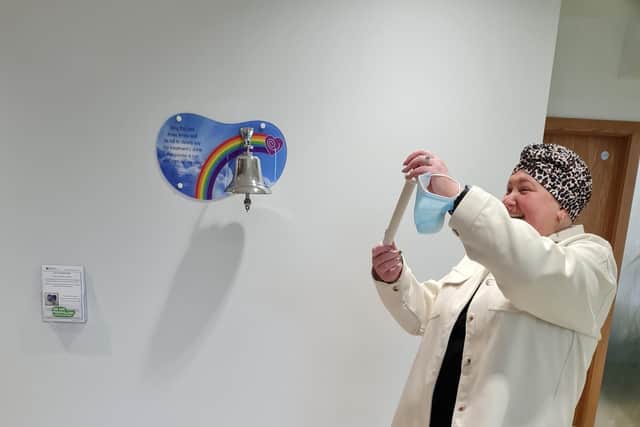 Claire rings the bell to mark the end of her chemotherapy at North West Cancer Centre in Derry.